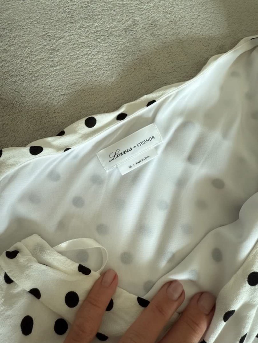 Black and white polka dot off the shoulder dress